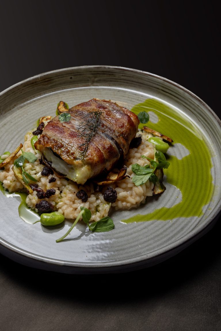 Jake Bullock Black pudding and broad bean risotto with pancetta wrapped haddock